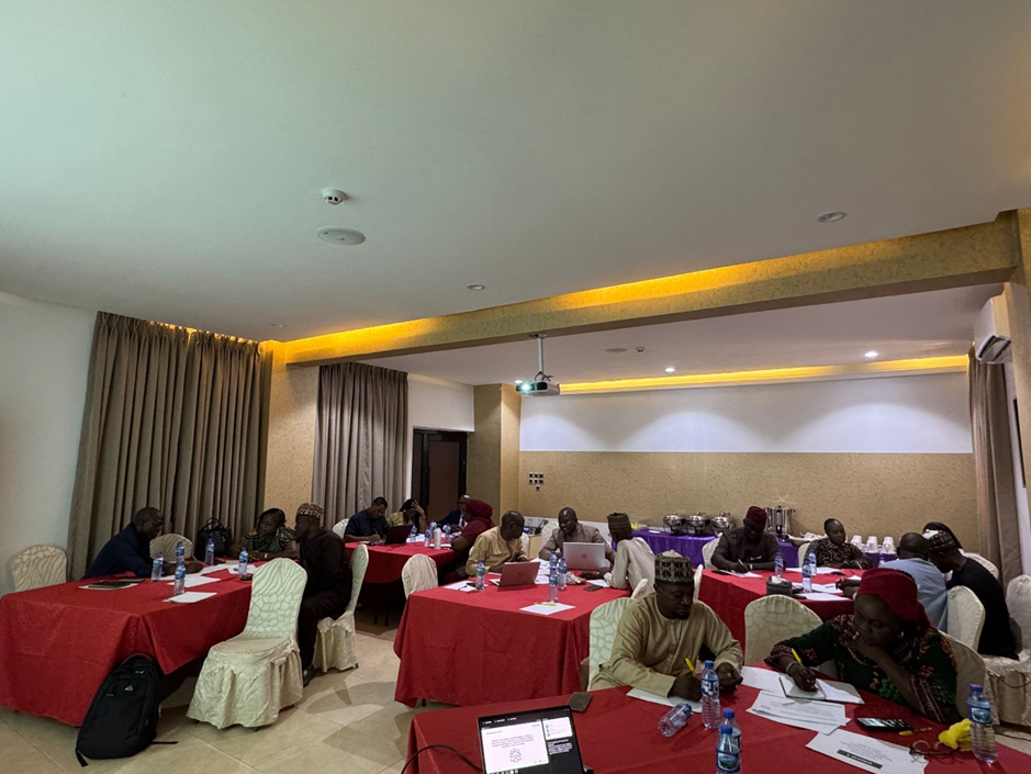 Participants working on their group exercise on tax policy reform appraisal